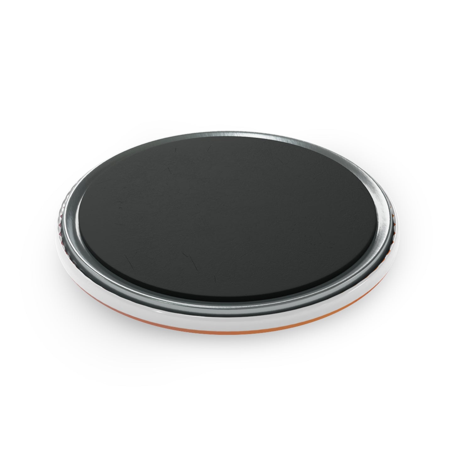 Black circular object with metallic rim on a white background