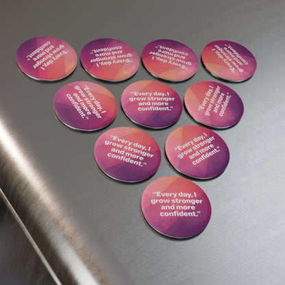 Motivational stickers with affirmations on a metallic surface