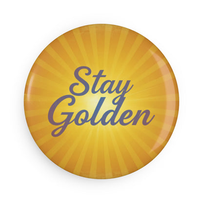 Round yellow button with 'Stay Golden' text on a white background